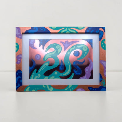 A framed abstract art print featuring vibrant, swirling psychedelic patterns in teal, purple, blue, and pink, set against a clean white background.